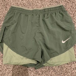 Green Nike shorts
